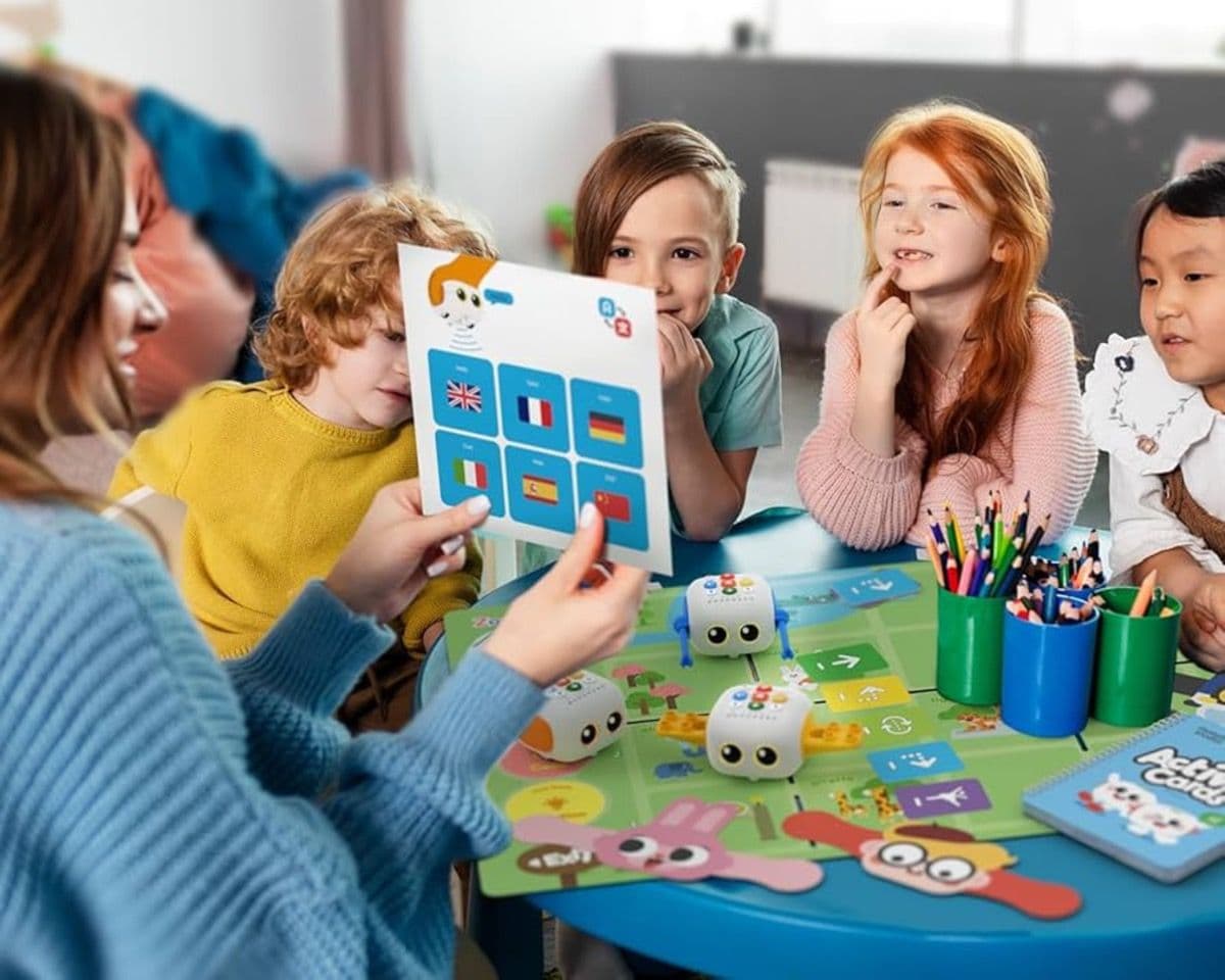 Teacher using MatataStudio Tale-Bot Pro with young learners in classroom