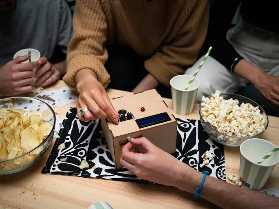 Group of friends gathered around an Arduino IoT Bundle project