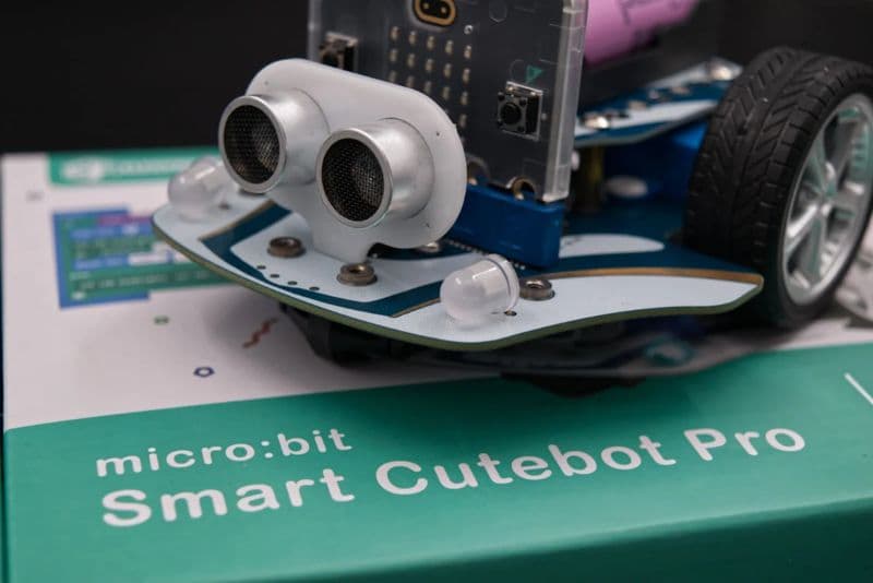 Close-up of the ELECFREAKS Smart Cutebot Pro robot on its packaging box