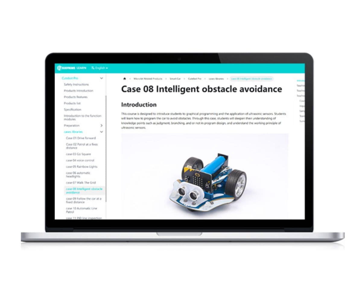 Cutebot Pro robot car displayed next to a laptop showing the obstacle avoidance tutorial