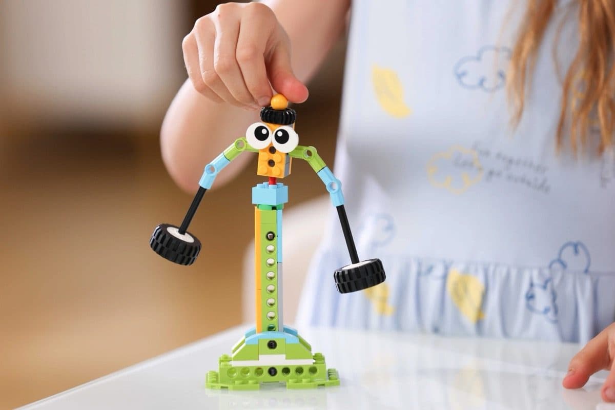 Close-up of a completed Makerzoid build with a girl in the background