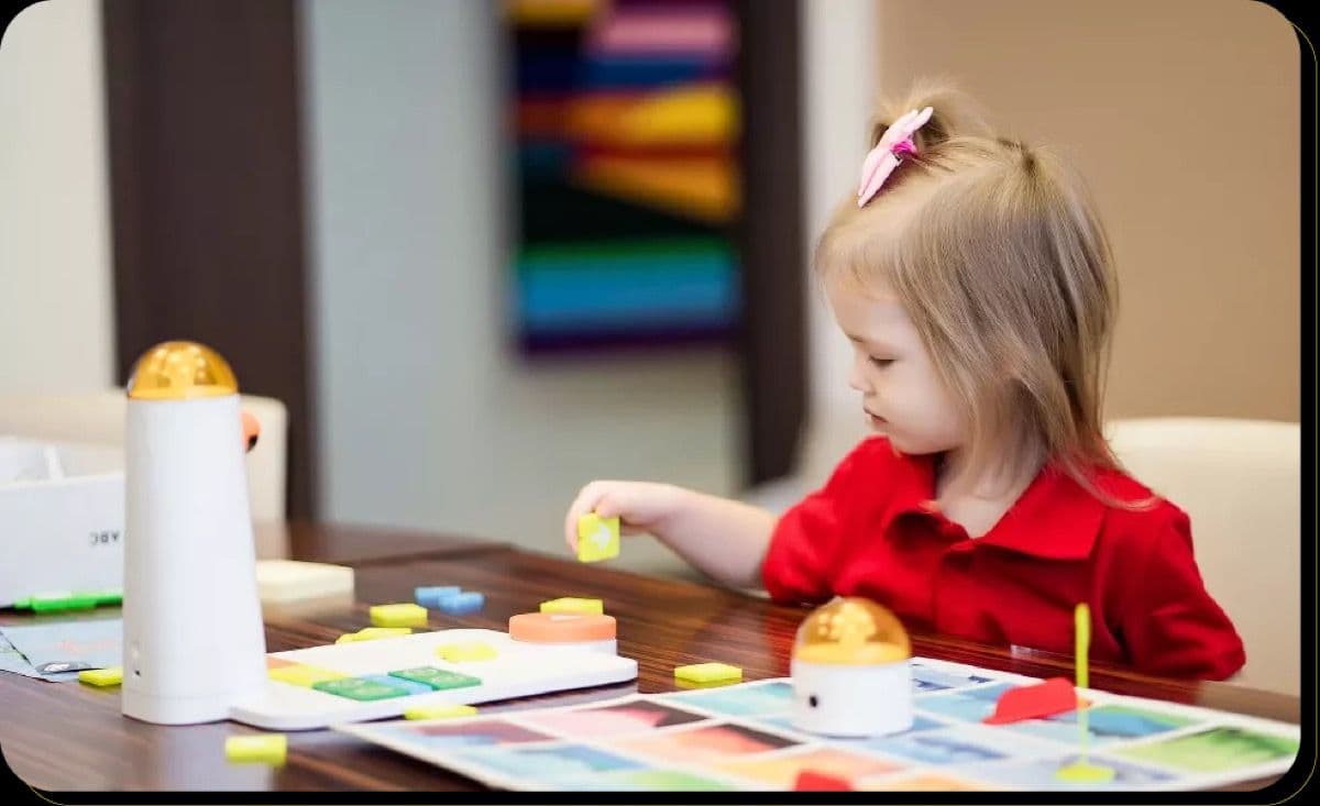 Young child engaged with the MatataStudio Coding Set Pro