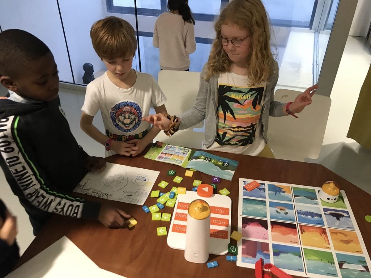Two learners working together on a MatataStudio coding challenge