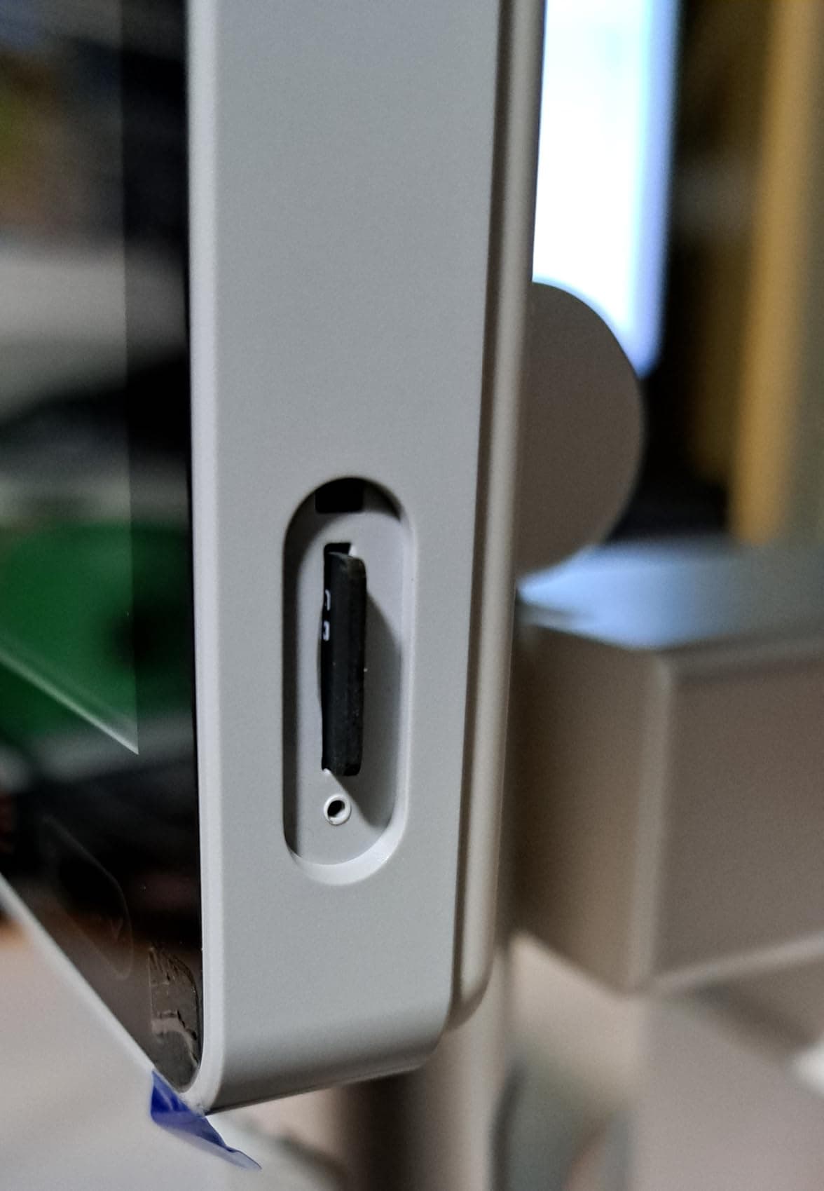 8GB microSD card inserted into the side slot of the MX2-AS microscope