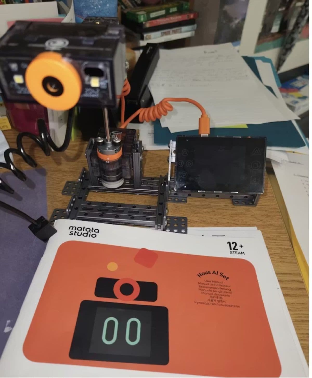 Nous AI robot with instruction booklet