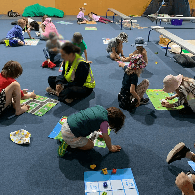 Children playing with Tale-Bot Pro in a classroom setting