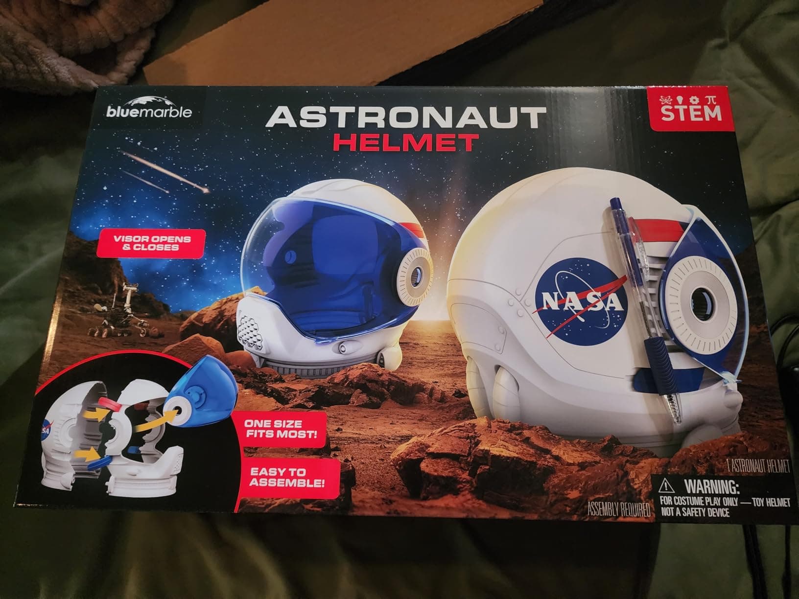 Blue Marble Astronaut Helmet box showing visor opens and closes