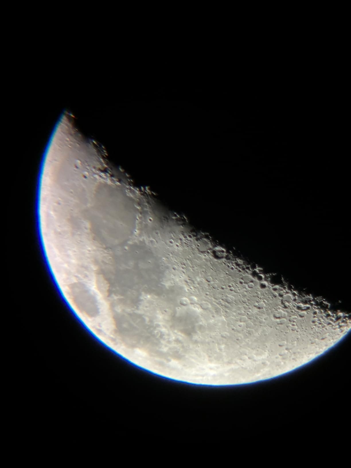 Moon viewed through the telescope eyepiece