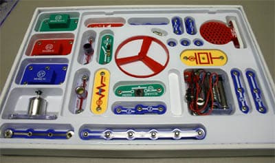 Snap Circuits components organized in storage box
