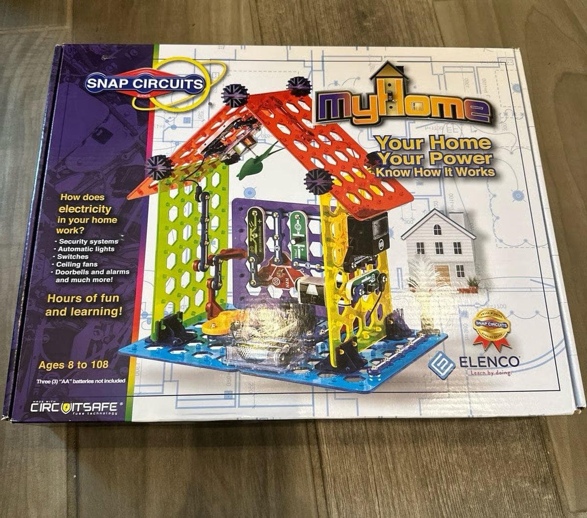 Snap Circuits My Home box laid out on floor ready to build